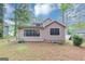 View of the back of the house showing large windows at 916 Forest Pointe, Jonesboro, GA 30238