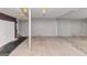 Open carpeted basement with lighting and adjacent mirror at 916 Forest Pointe, Jonesboro, GA 30238