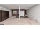 Open basement with carpet, lighting, and a closet for storage at 916 Forest Pointe, Jonesboro, GA 30238
