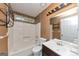 Bathroom features shower, toilet, vanity, and natural light at 916 Forest Pointe, Jonesboro, GA 30238