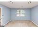 Cozy bedroom with carpet, window, and neutral color palette at 916 Forest Pointe, Jonesboro, GA 30238