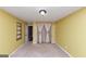Bedroom featuring carpeted floors and window with curtains at 916 Forest Pointe, Jonesboro, GA 30238