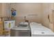 Convenient laundry room with modern washer and dryer appliances at 916 Forest Pointe, Jonesboro, GA 30238