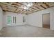 Spacious basement with neutral carpeting and glass doors leading to the outside, great for entertaining at 115 Blue Grass Way, Oxford, GA 30054