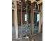 Interior showing exposed studs, windows, and electrical wiring throughout at 908 Emory St, Oxford, GA 30054