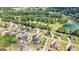 Aerial view of the community featuring a golf course and lake, highlighting the natural beauty and recreational opportunities available at 1516 Winward Dr, Locust Grove, GA 30248