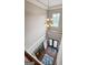 Two-story foyer with hardwood floors, chandelier, and a view of the entryway at 1516 Winward Dr, Locust Grove, GA 30248