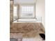 The bathroom features a separate soaking tub and shower stall, as well as neutral tiling at 1516 Winward Dr, Locust Grove, GA 30248