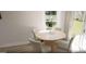 Dining nook with round table and view to the backyard at 2032 Piccolo Ct # 226, Mcdonough, GA 30252
