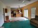 Open living space blending the kitchen and seating area, with lots of natural light at 690 Gateway Ct, Stone Mountain, GA 30087