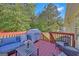 Relax on this spacious wooden deck with outdoor furniture and grill perfect for entertaining guests or unwinding at 2006 Carrollton Hwy, Temple, GA 30179