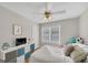 Neutral bedroom with a ceiling fan, a TV, a double bed, and natural light at 2006 Carrollton Hwy, Temple, GA 30179