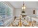 Charming dining room with a window view and light fixture at 2006 Carrollton Hwy, Temple, GA 30179
