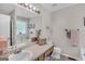 Bright main bathroom with bathtub, a sink, and modern decor at 2006 Carrollton Hwy, Temple, GA 30179