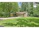 Exterior of a home with attached garage on a well-maintained, grassy lawn at 152 Dana Dr, Fayetteville, GA 30215