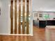 Bright hallway featuring wood floors and a decorative privacy screen at 152 Dana Dr, Fayetteville, GA 30215