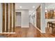 Hallway with wood floors and decorative partition between the dining and hallway spaces at 152 Dana Dr, Fayetteville, GA 30215