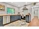 Contemporary kitchen with stainless steel appliances, butcher block counters, and ample natural light at 152 Dana Dr, Fayetteville, GA 30215