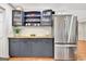 Kitchen with stainless steel refrigerator, butcher block counters, and modern cabinetry at 152 Dana Dr, Fayetteville, GA 30215
