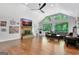 Spacious living room features a fireplace, hardwood floors, and large windows at 152 Dana Dr, Fayetteville, GA 30215