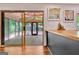 View of the porch from inside the home. The room has wood floors and access to backyard at 152 Dana Dr, Fayetteville, GA 30215