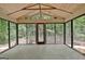 Spacious screened porch with views of the private, wooded backyard at 152 Dana Dr, Fayetteville, GA 30215