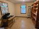 Bedroom featuring floral print curtains and shelf at 4884 Maurice Nw Dr, Lilburn, GA 30047