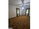 Cozy bedroom featuring a ceiling fan and neutral walls at 4884 Maurice Nw Dr, Lilburn, GA 30047