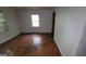 Bedroom with hardwood flooring and window at 1417 Lake Cir, Mableton, GA 30126