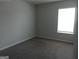 Neutral bedroom with wall to wall carpeting and a window at 2134 Main Nw St, Atlanta, GA 30318