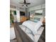 Inviting bedroom with neutral tones, wood floors, a walk-in closet, and a calming aesthetic for rest and relaxation at 2134 Main Nw St, Atlanta, GA 30318