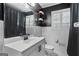 Bathroom with tile, updated sink and modern fixtures at 7121 Forest Se Dr, Covington, GA 30014