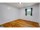 Bedroom featuring hardwood floors, natural light, and neutral walls at 7121 Forest Se Dr, Covington, GA 30014