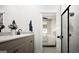 Stylish bathroom featuring a double vanity, sleek countertops, and a glass shower at 1212 Trombone Way # 107, Mcdonough, GA 30252