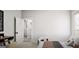 Bright bedroom with a neutral palette and comfortable furnishings at 1212 Trombone Way # 107, Mcdonough, GA 30252