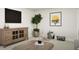 Cozy living room with decorative furnishings and warm wood cabinet at 1212 Trombone Way # 107, Mcdonough, GA 30252