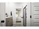 Open bathroom with a double sink vanity, and a standing glass shower at 100 Trombone Way, Mcdonough, GA 30252