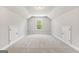 Spacious bonus room with natural light and bonus storage space, perfect for a home office or play area at 1547 South Bethany Rd, Locust Grove, GA 30248