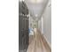Bright foyer with grey walls, wood floors, and stairs leading to the second level of the home at 1547 South Bethany Rd, Locust Grove, GA 30248