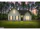 Charming home with board and batten siding, a covered front porch and a well-manicured lawn at 1547 South Bethany Rd, Locust Grove, GA 30248