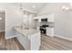 Kitchen featuring granite counters, stainless appliances and vaulted ceilings at 1547 South Bethany Rd, Locust Grove, GA 30248