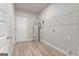 Utility room with modern water heater and ample storage space at 1547 South Bethany Rd, Locust Grove, GA 30248