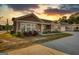 Inviting exterior showcasing neutral siding, a charming front porch, and well-maintained landscaping at 2929 Rambler Dr, Loganville, GA 30052