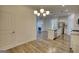 An open concept kitchen featuring a kitchen island and stainless steel appliances at 2929 Rambler Dr, Loganville, GA 30052
