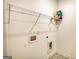 Laundry room with built-in shelving and utility connections at 2929 Rambler Dr, Loganville, GA 30052