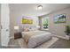This staged bedroom features a queen bed, carpet, and a window overlooking mature trees at 1555 South Bethany Rd, Locust Grove, GA 30248
