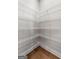 Walk-in pantry with wire shelving provides ample storage space for all your kitchen essentials at 1555 South Bethany Rd, Locust Grove, GA 30248