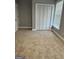 Bedroom featuring neutral walls, carpet flooring, a window, and a closet at 2200 Hickory Station Cir, Snellville, GA 30078