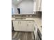 Kitchen featuring white cabinets, stainless steel sink and stainless steel appliances at 2200 Hickory Station Cir, Snellville, GA 30078