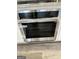 Stainless steel oven, still wrapped in the plastic, in a kitchen remodel at 2200 Hickory Station Cir, Snellville, GA 30078
